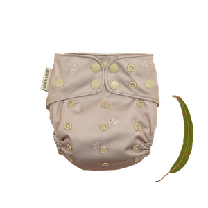 'Koala Cuddles' is a gender neutral, Australiana inspired print. It features adorable little, hand-illustrated koalas on a lovely neutral taupe background. Cloth Club Reusable Nappies