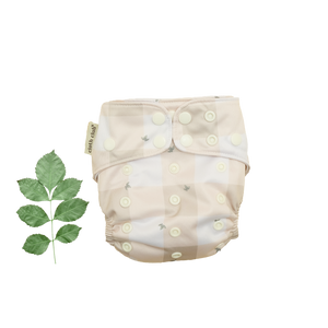 'Picnic in the Park' is a gender neutral, Australiana inspired print. It features an ivory, light tan and beige gingham with highlights of little sage green leaves dotted about. Cloth Club Reusable Cloth Nappies