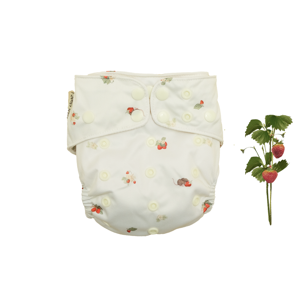'Strawberry Fields' is a beautifully but not strictly feminine print. It features an ivory background with darling, hand-illustrated red strawberries, pale yellow flowers, sage green leaves and tiny light-brown field mice. Cloth Club Reusable Nappies